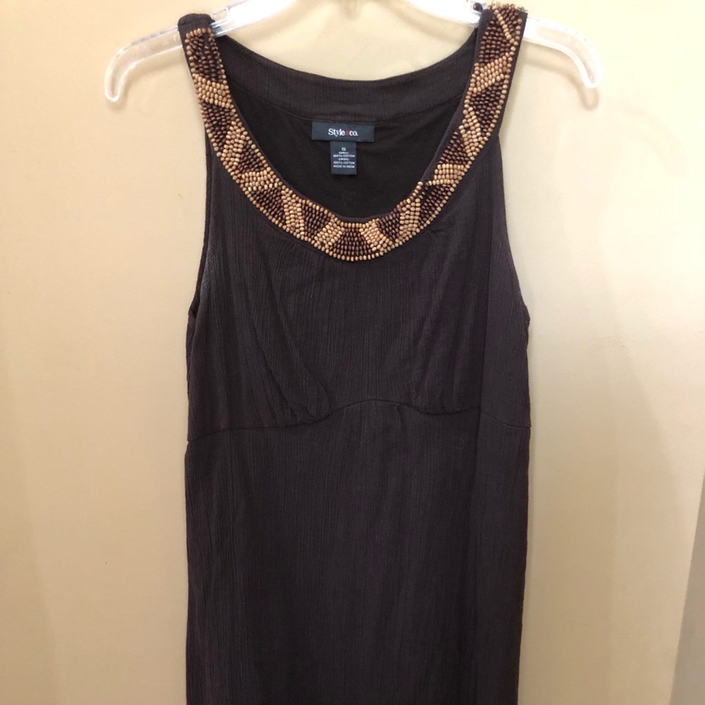 Brown dress with wooden beaded collar